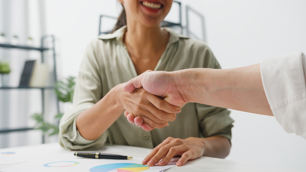 immagine che rappresenta una stretta di mano amichevole